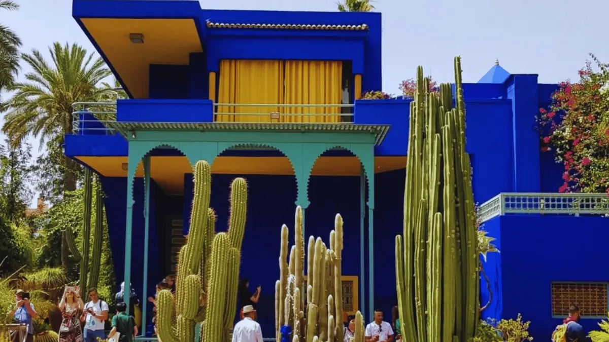 Horse-drawn caleche waiting by the ramparts near Jardin Majorelle on a Jardin Majorelle ticket and carriage ride in Marrakech